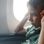 prevent child's ear from popping when riding a plane