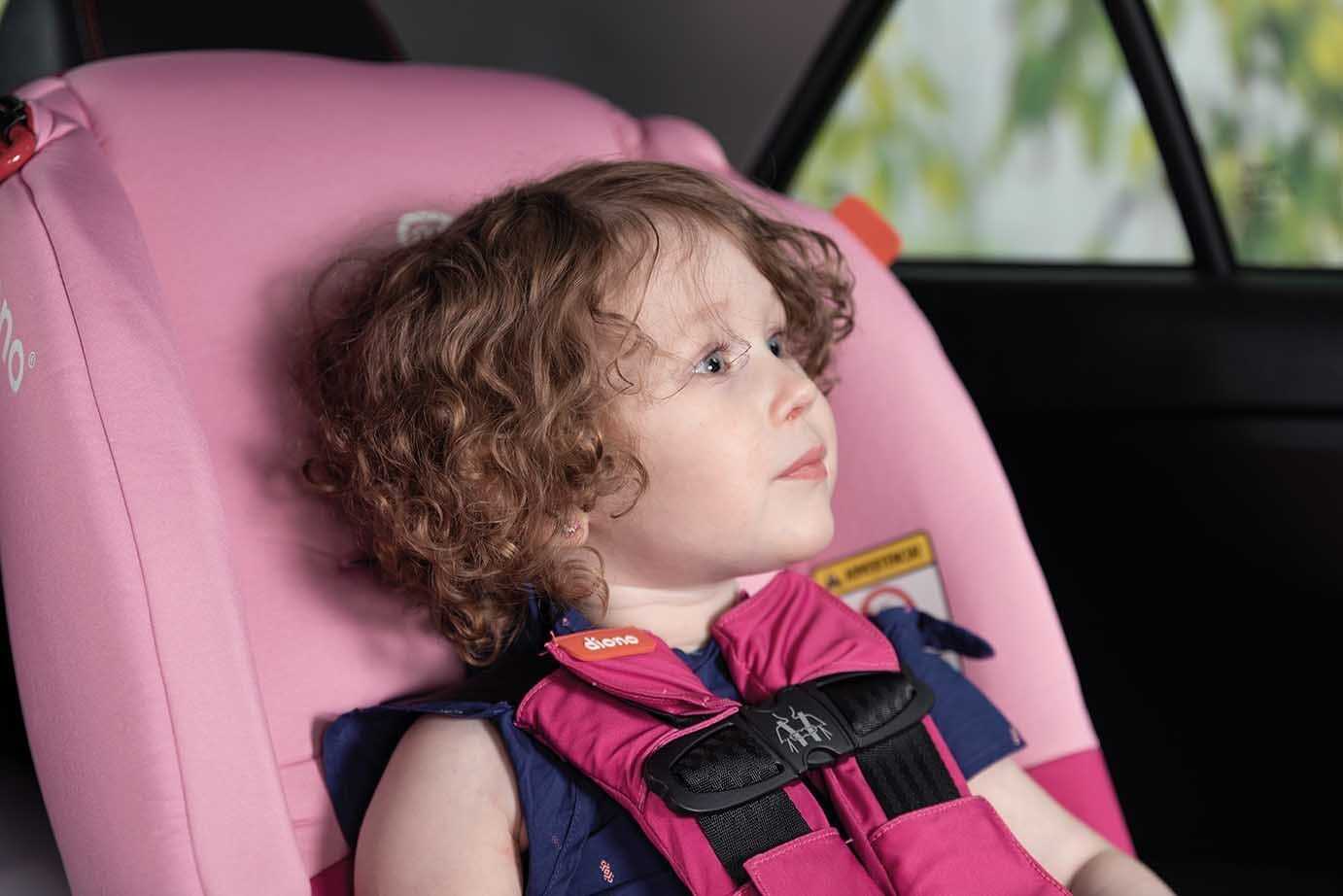 kid in car seat 1